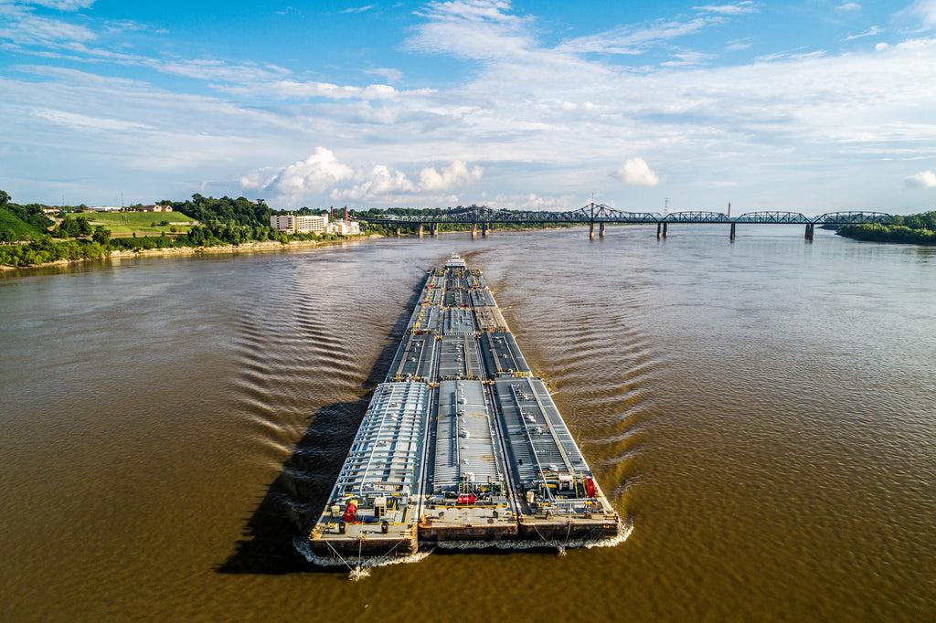 barge floating down river marine ballast